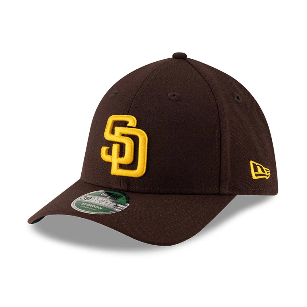 Pictured is this MLB Player Replica San Diego Padres 39THIRTY M-Crown Stretch Fit cap in dark brown. 1