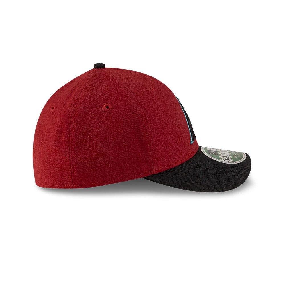 Diamondbacks MLB Player Replica Dark Red New Era 39THIRTY M-Crown Stretch Fit Cap, side view showing the unstructured dark red crown with embroidered eyelets and a curved black visor featuring a 39THIRTY size sticker.