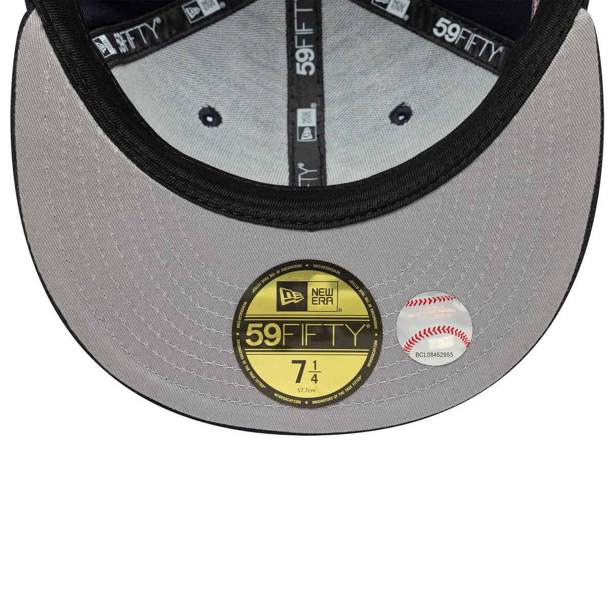 New York Yankees MLB Cooperstown Floral Navy New Era 59FIFTY Fitted Cap, inside view showing black branded taping, a grey undervisor with a gold 59FIFTY size sticker and a baseball sticker, and a black sweatband.