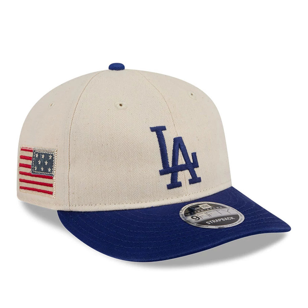 LA Dodgers MLB Americana Herringbone Dark White Retro Crown New Era 9FIFTY Adjustable Cap, three-quarter view showing the blue embroidered LA logo on the front panel, blue visor with a 9FIFTY size sticker, and American flag on the left side.