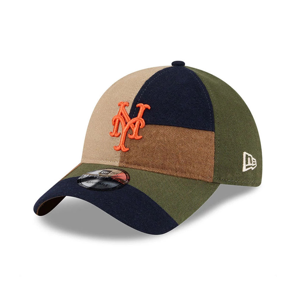 New York Mets MLB Patchwork Open Brown New Era 9TWENTY Adjustable Cap, three-quarter view showing the orange embroidered Mets logo on the front panel with a contrasting patchwork of tan, navy and green, and a 9TWENTY size sticker on the visor.