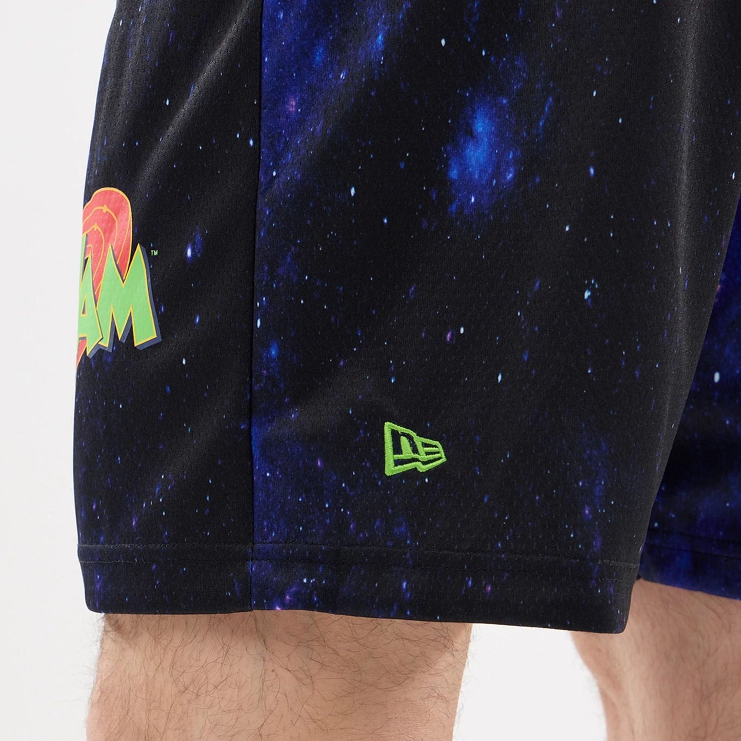 The model is wearing this Warner Brothers Space Jam Oversized Shorts in white. 5