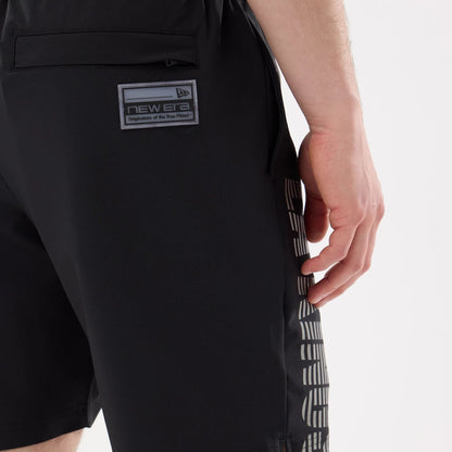 The model is wearing this NHL Match LA Kings Oversized Shorts in black. 7