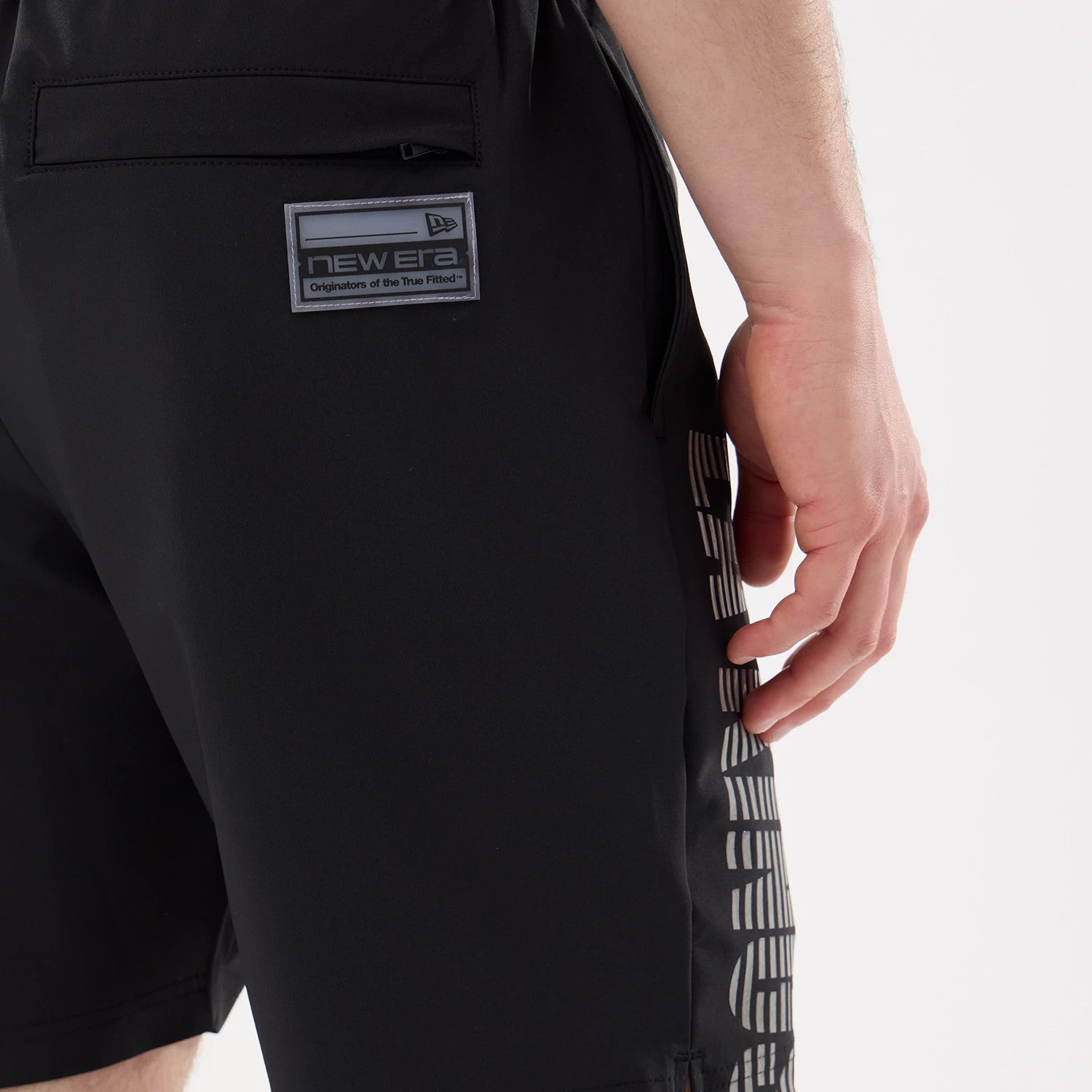 The model is wearing this NHL Match LA Kings Oversized Shorts in black. 7