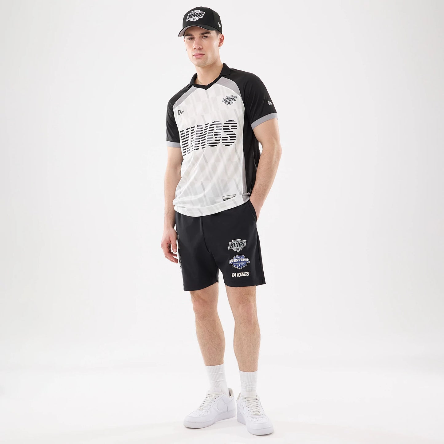 The model is wearing this NHL Match LA Kings Oversized Shorts in black. 8