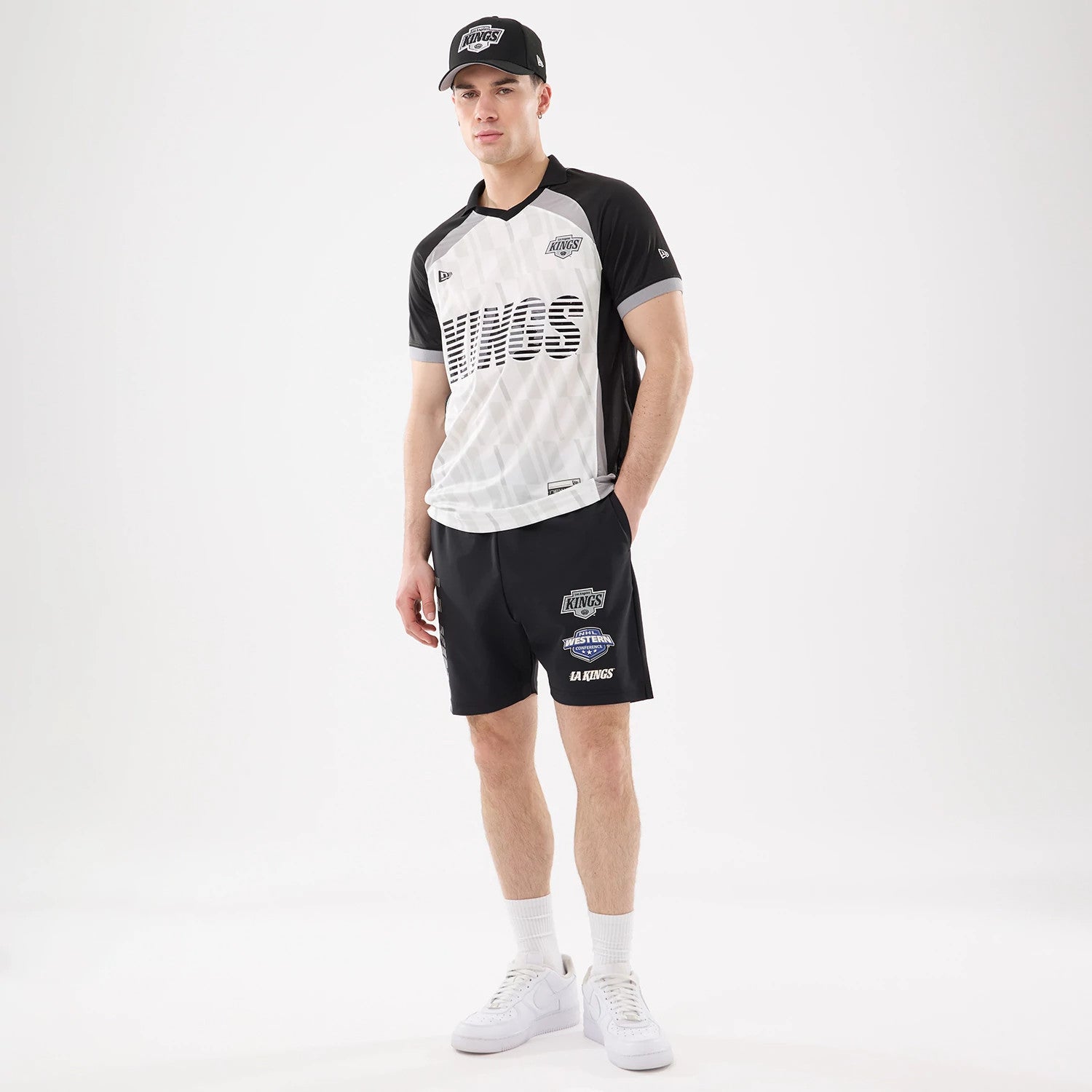 The model is wearing this NHL Match LA Kings Oversized Shorts in black. 8