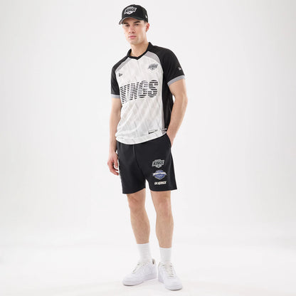 The model is wearing this NHL Match LA Kings Oversized Shorts in black. 8