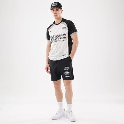 The model is wearing this NHL Match LA Kings Oversized Shorts in black. 8