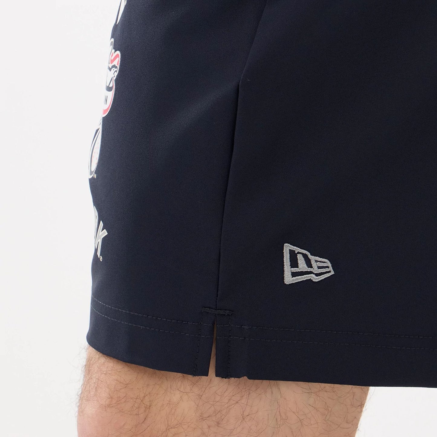 The model is wearing this MLB Match New York Yankees Oversized Shorts in navy. 4