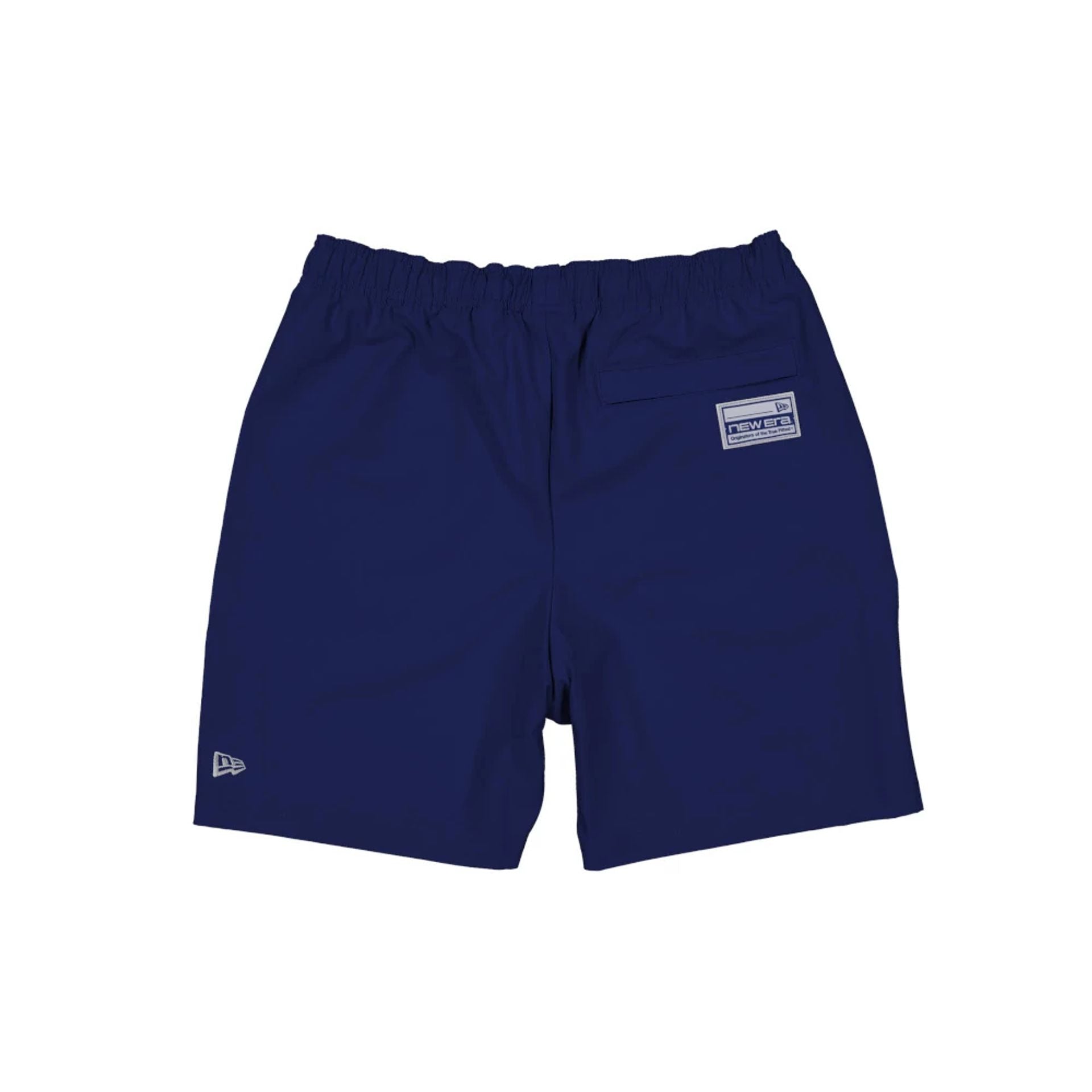 The model is wearing this MLB Match LA Dodgers Oversized Shorts in dark blue. 2