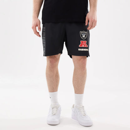 The model is wearing this NFL Match Las Vegas Raiders Oversized Shorts in black. 5