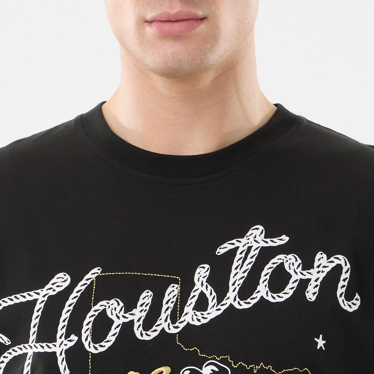 The model is wearing this MLB Cowboy Graphic Houston Astros T-Shirt in black. 4