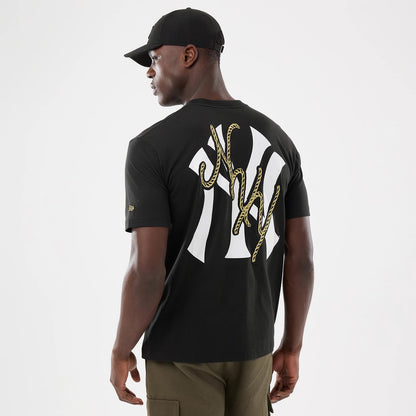 The model is wearing this MLB Cowboy Graphic New York Yankees T-Shirt in black. 2