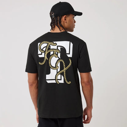 The model is wearing this MLB Cowboy Graphic Texas Rangers T-Shirt in black. 2