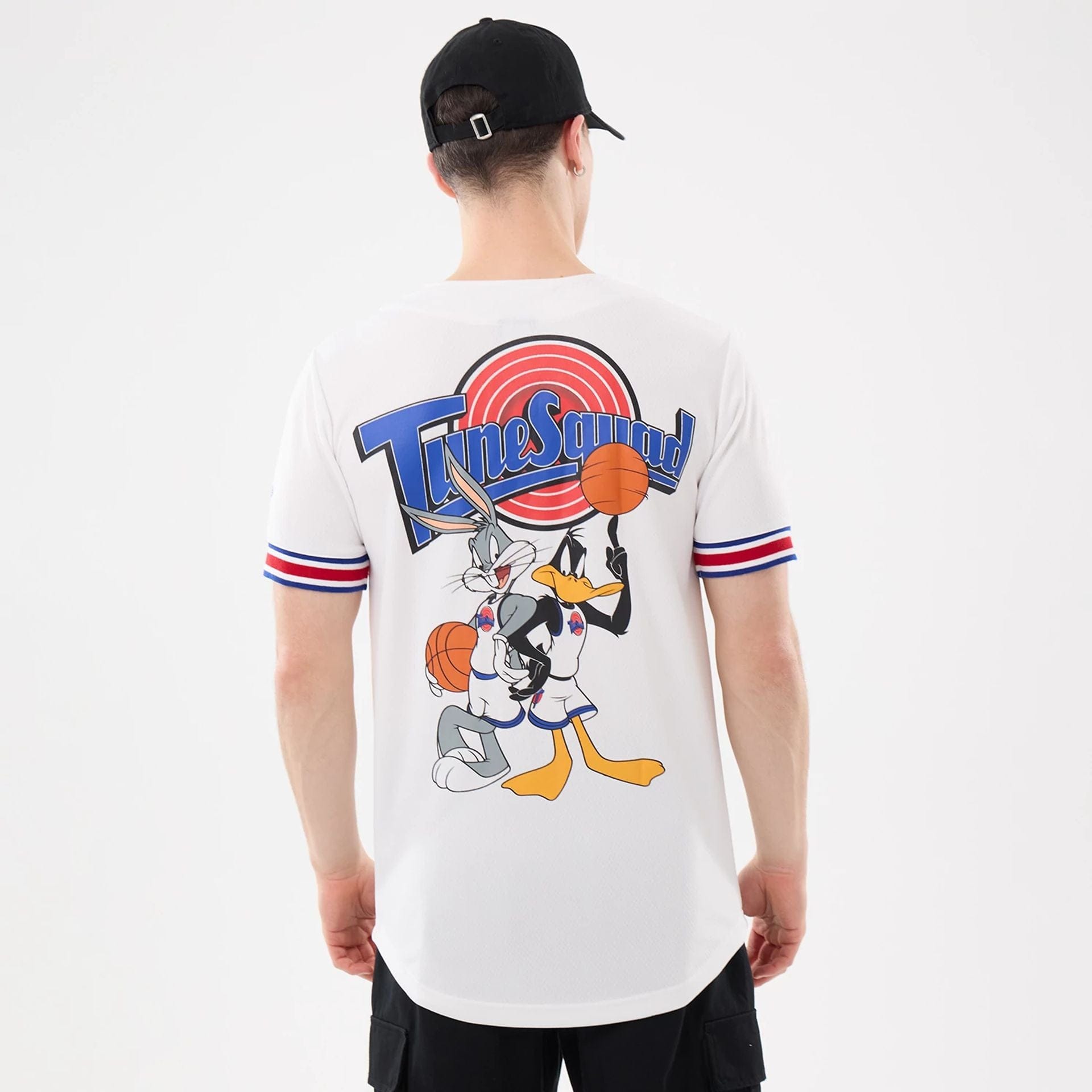 The model is wearing this Warner Brothers Space Jam Mesh Jersey in white. 2