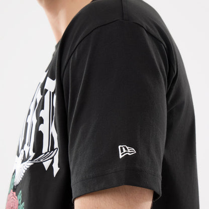 The model is wearing this MLB Script Graphic New York Yankees T-Shirt in black. 4