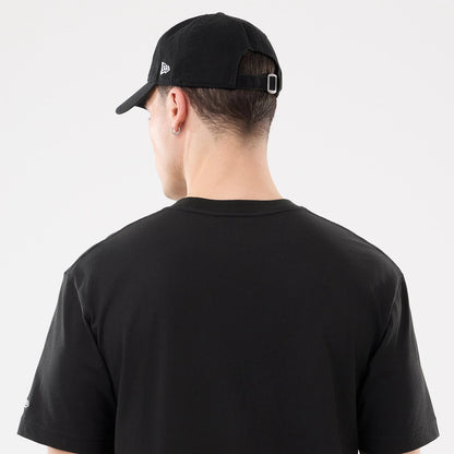 The model is wearing this MLB Script Graphic New York Yankees T-Shirt in black. 7