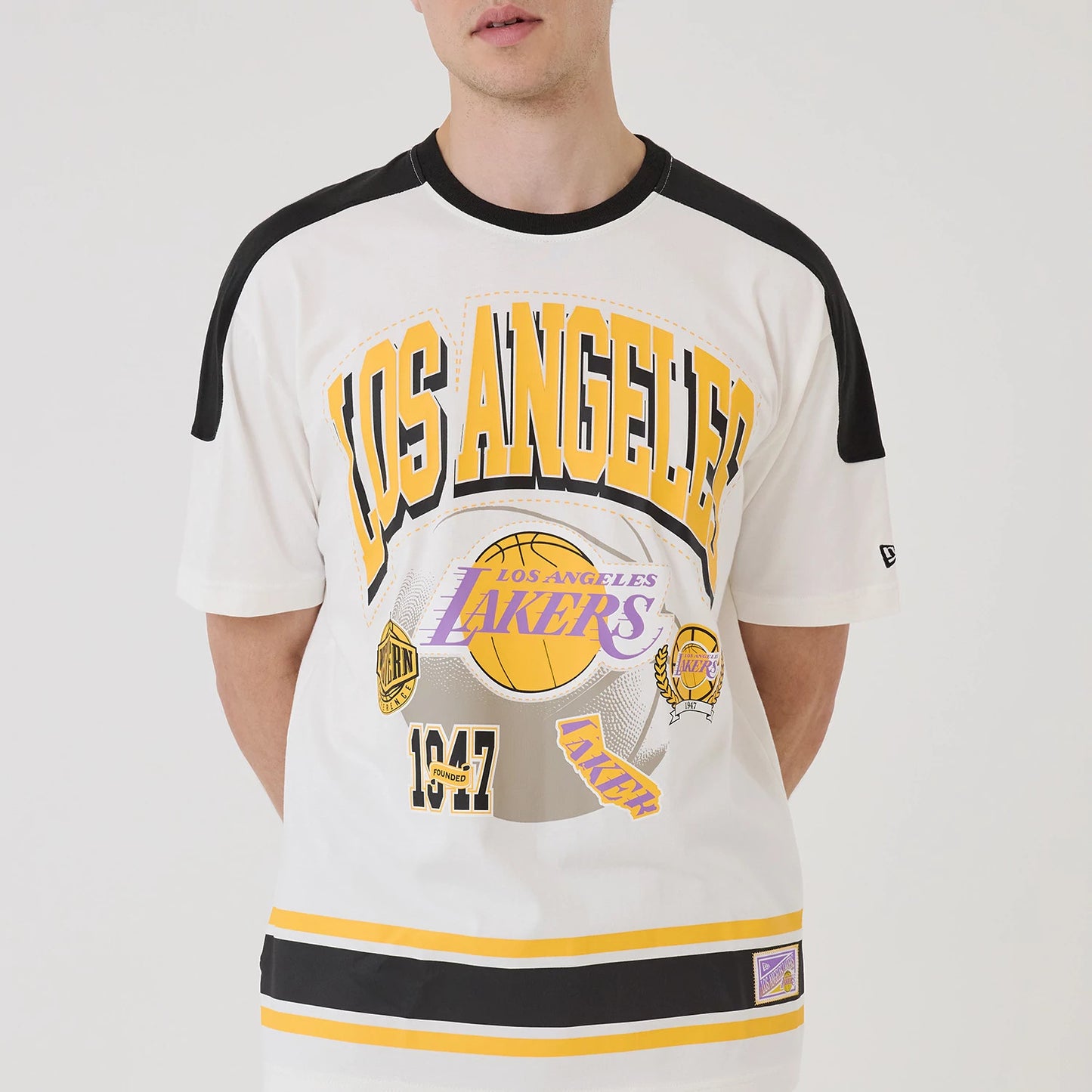 The model is wearing this NBA Sport Classic LA Lakers T-Shirt in white. 6