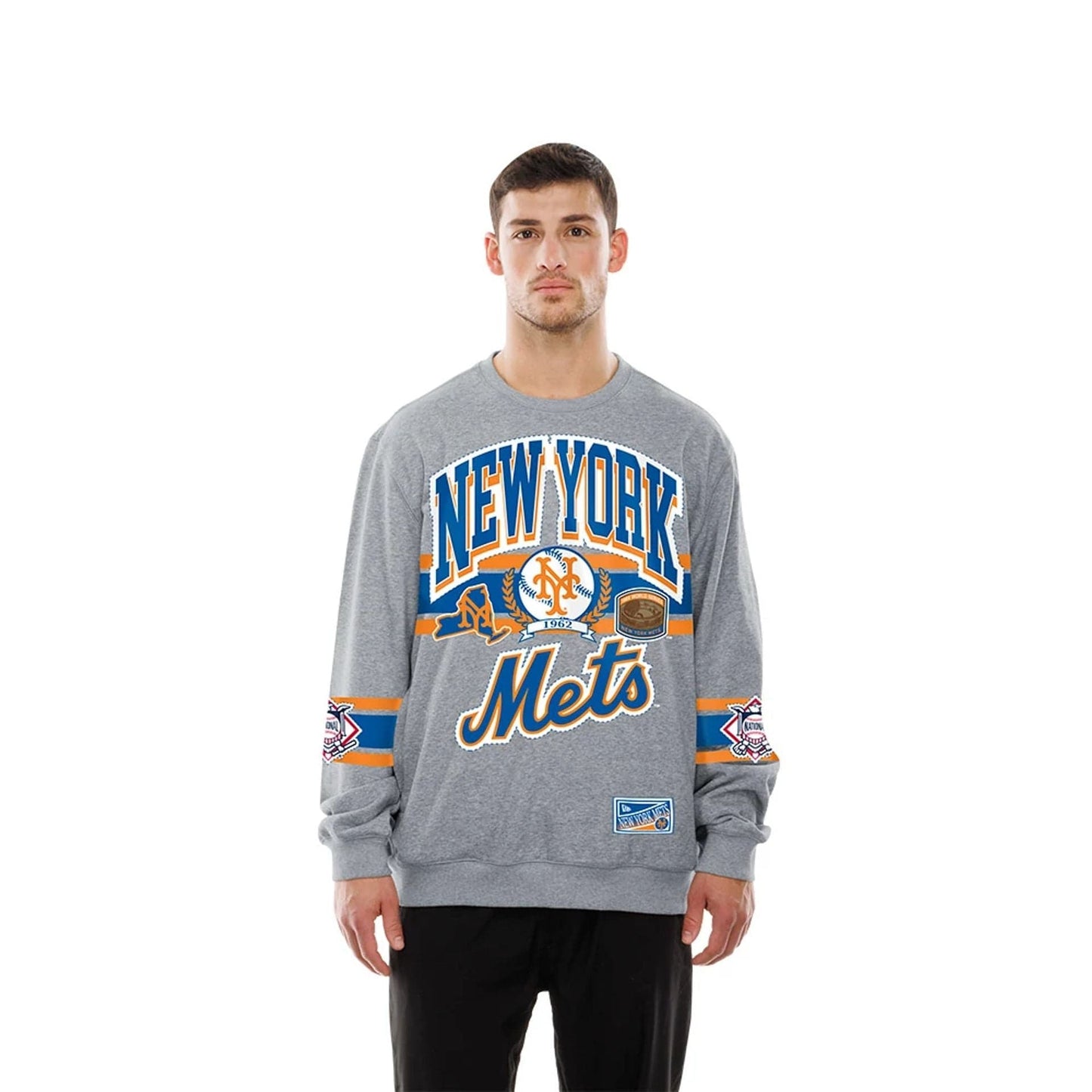 The model is wearing this MLB Sport Classic New York Mets Crew Neck Sweater in grey. 1