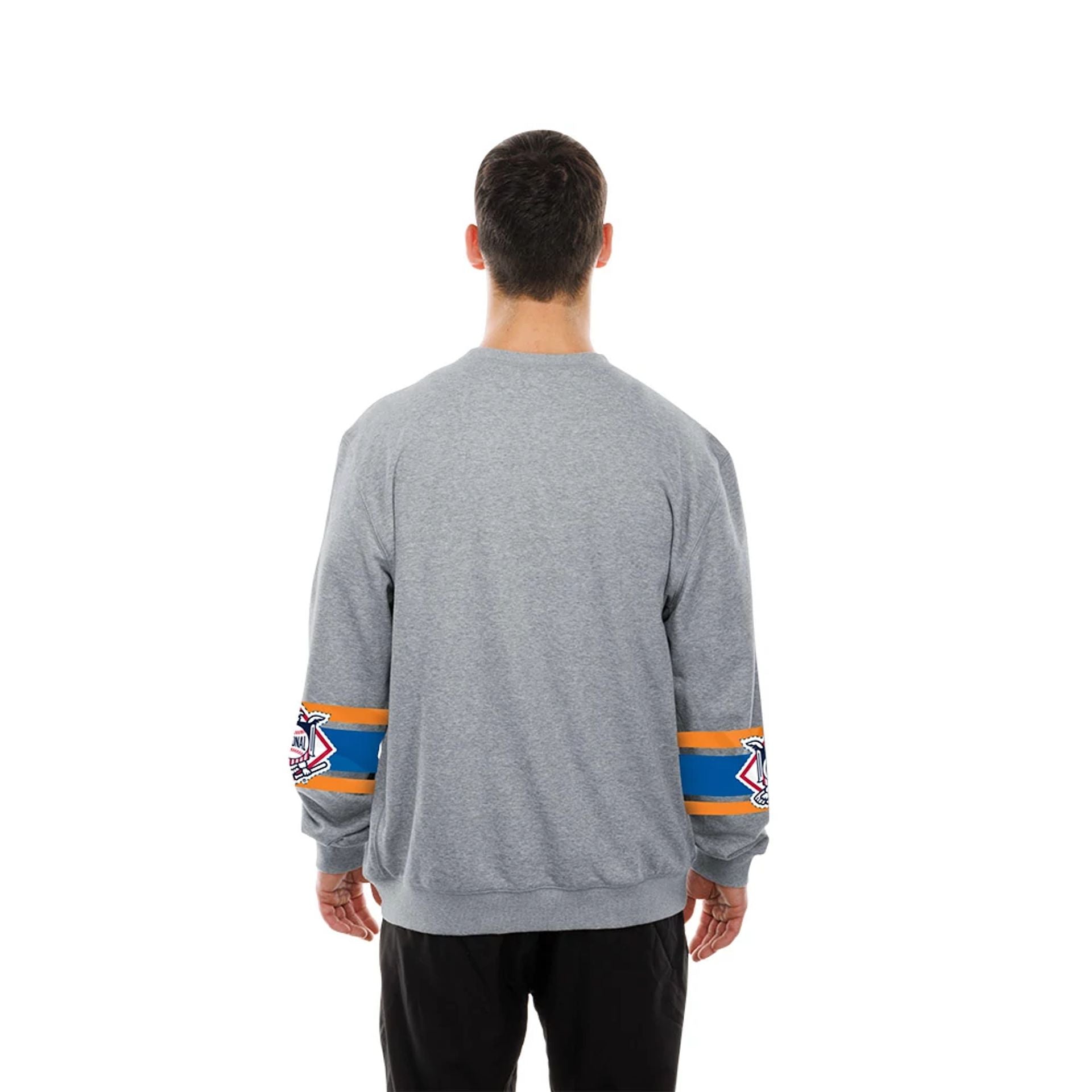 The model is wearing this MLB Sport Classic New York Mets Crew Neck Sweater in grey. 2