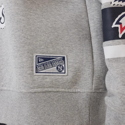 The model is wearing this MLB Sport Classic New York Yankees Crew Neck Sweater in grey. 7