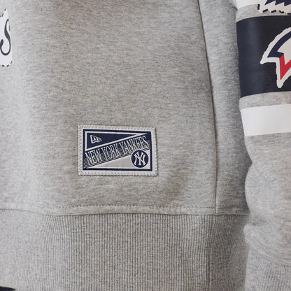 The model is wearing this MLB Sport Classic New York Yankees Crew Neck Sweater in grey. 7