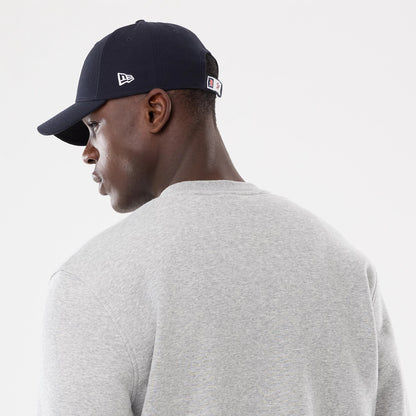 The model is wearing this MLB Sport Classic Detroit Tigers Crew Neck Sweater in grey. 5