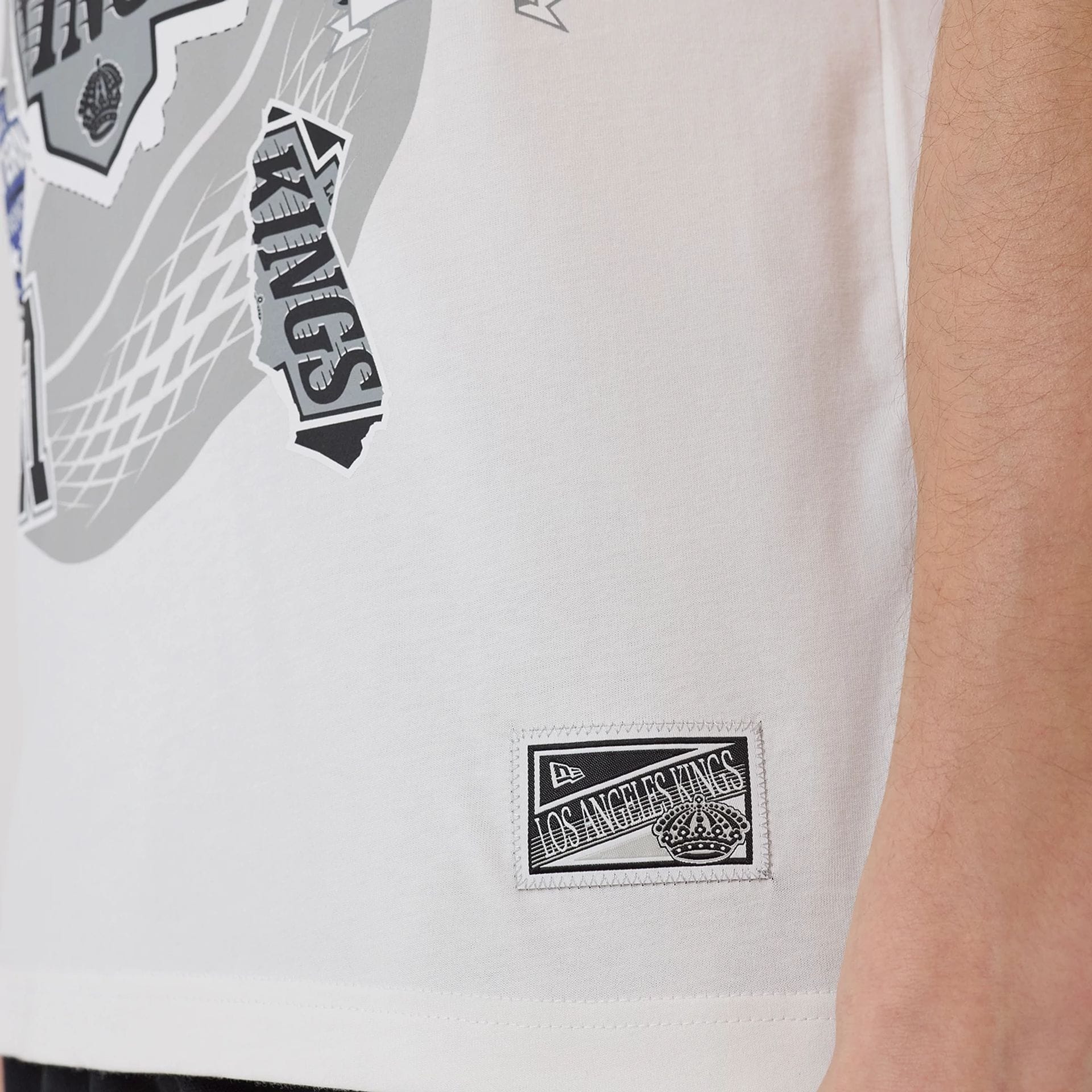 The model is wearing this NHL Sport Classic LA Kings T-Shirt in white. 4