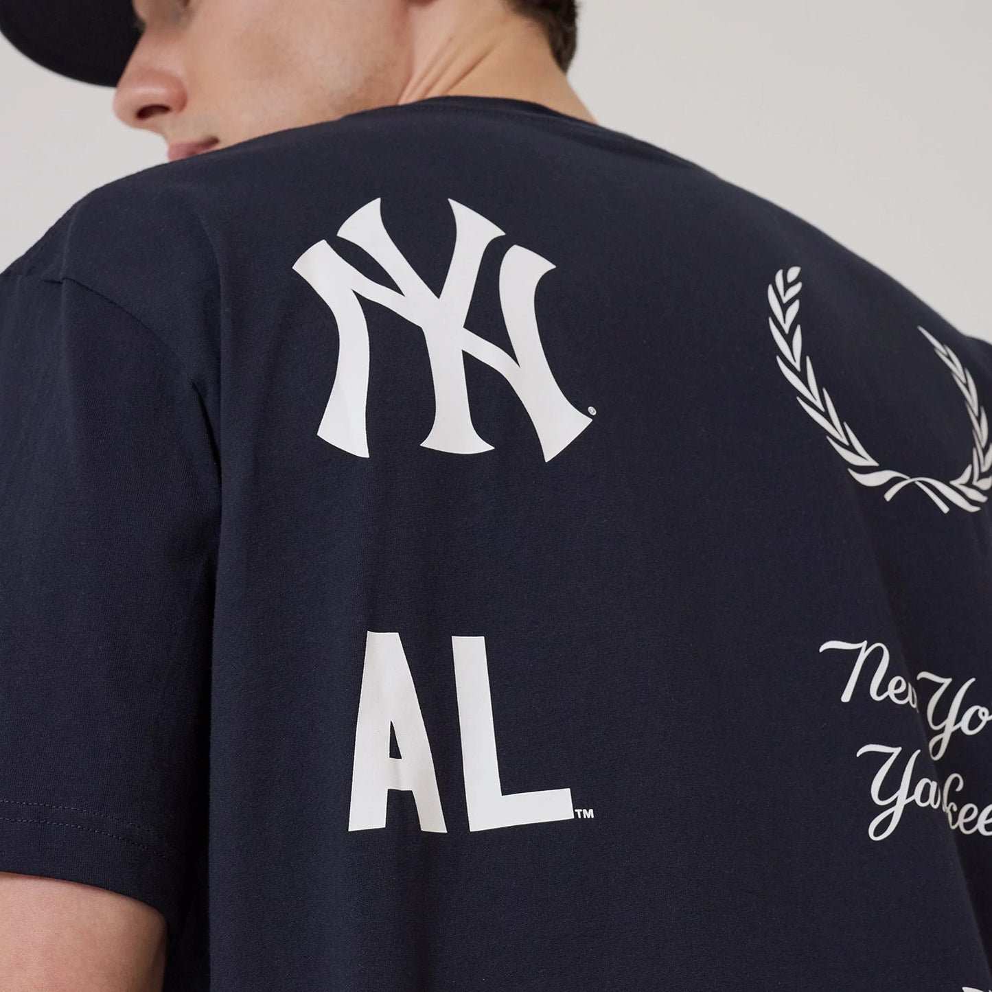 The model is wearing this MLB Match New York Yankees T-Shirt in navy. 4