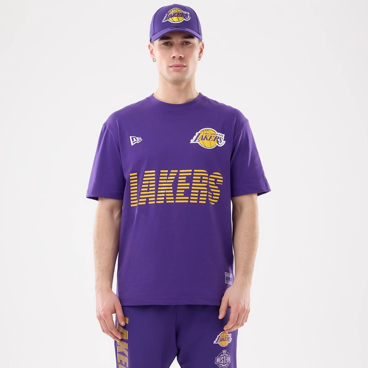 The model is wearing this NBA Match LA Lakers T-Shirt in purple. 1