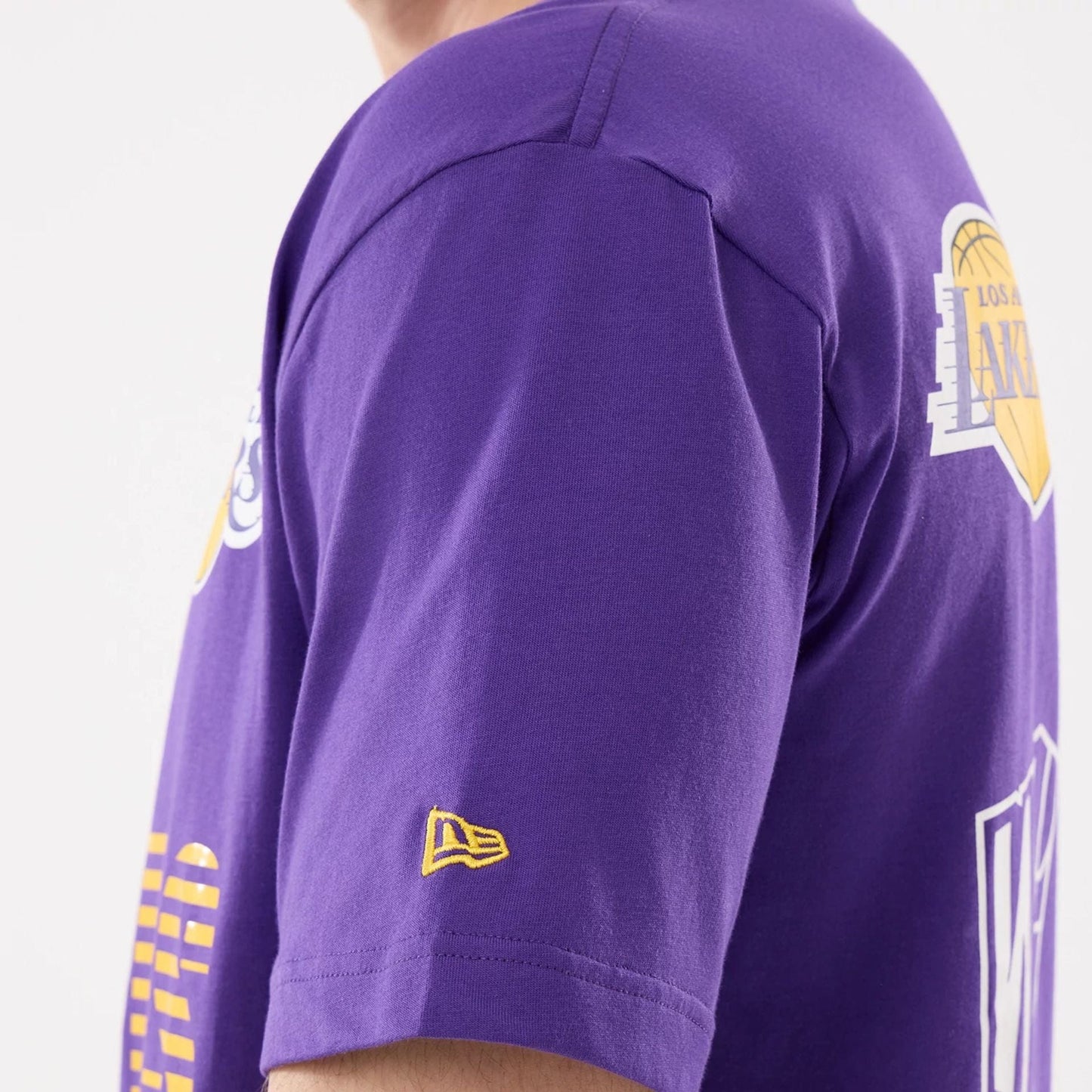 The model is wearing this NBA Match LA Lakers T-Shirt in purple. 4