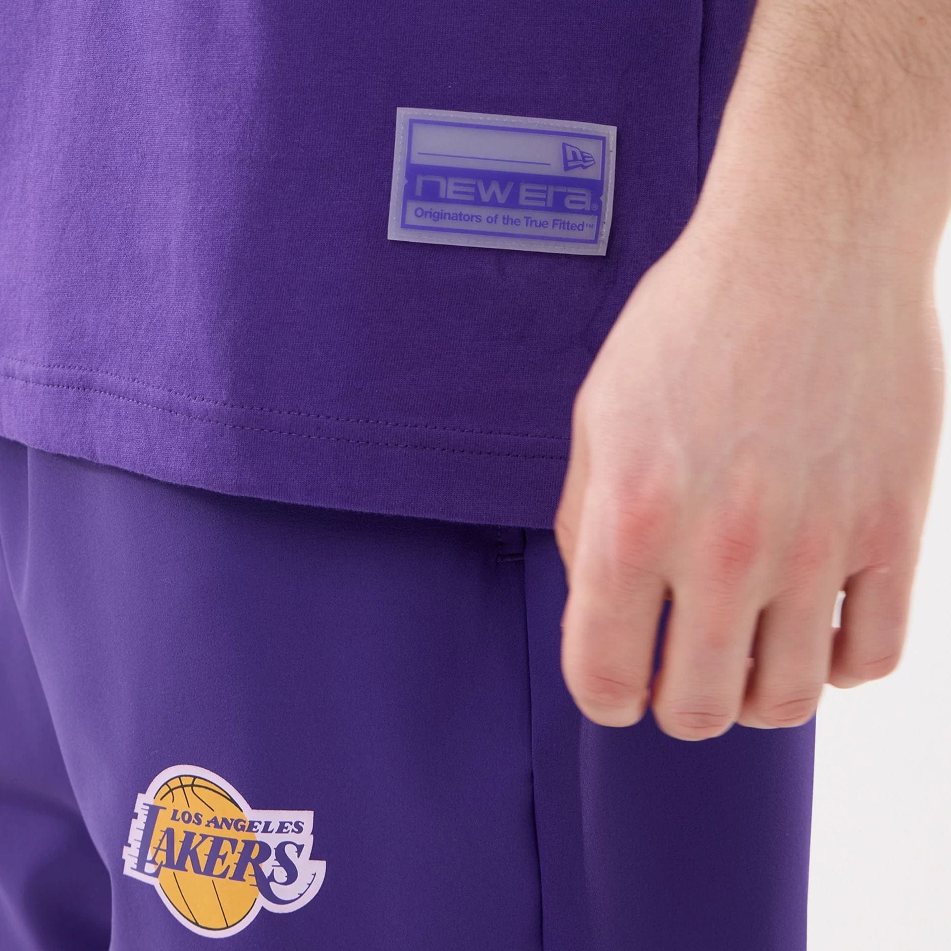 The model is wearing this NBA Match LA Lakers T-Shirt in purple. 5