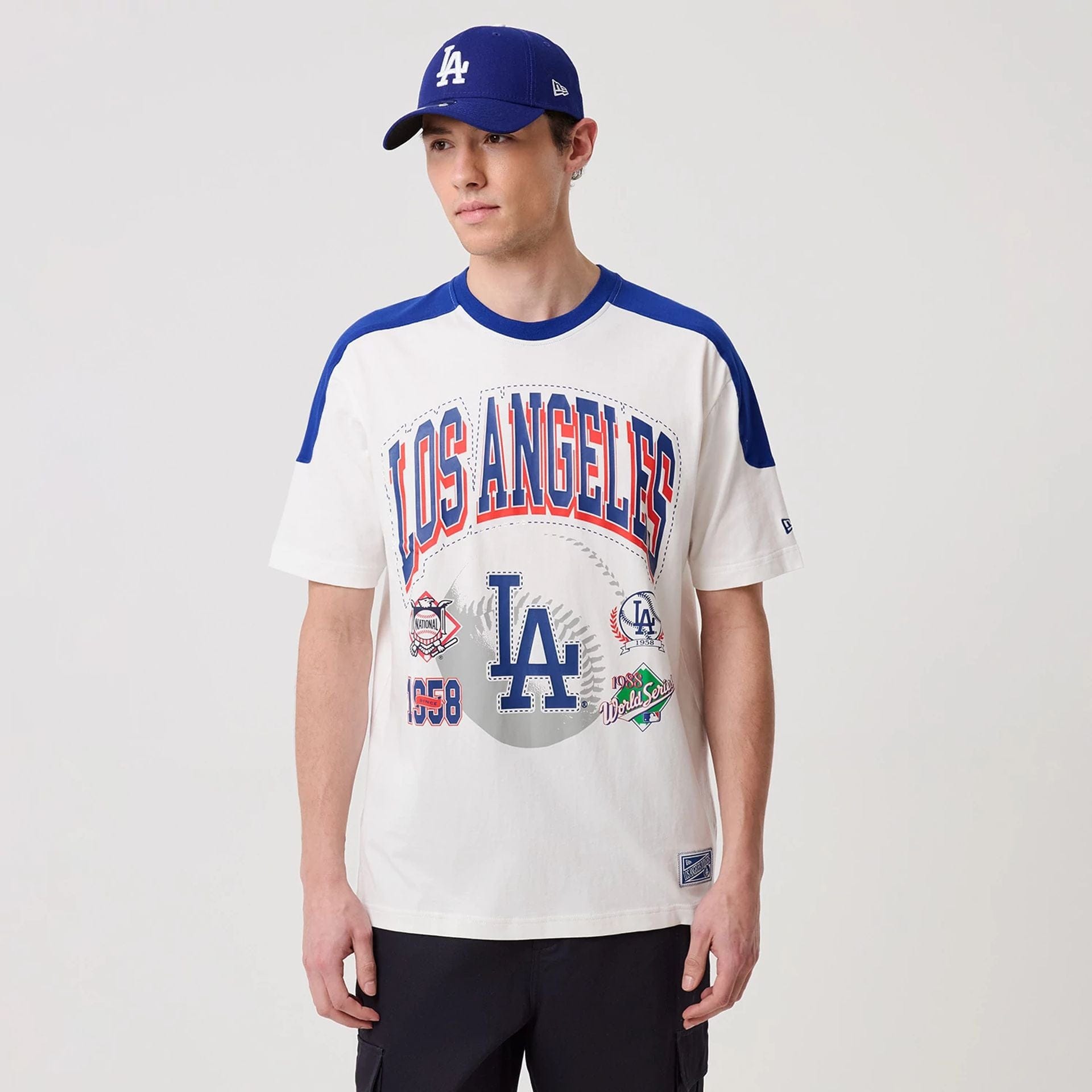 The model is wearing this MLB Sport Classic LA Dodgers T-Shirt in white. 1