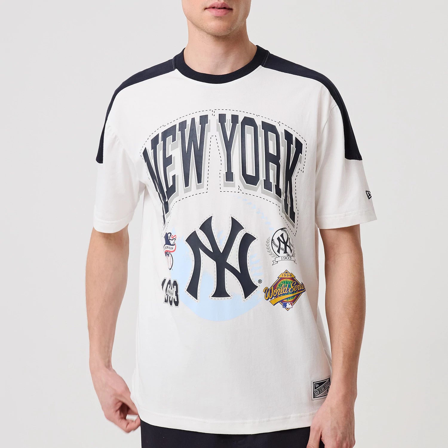 The model is wearing this MLB Sport Classic World Series New York Yankees T-Shirt in white. 5