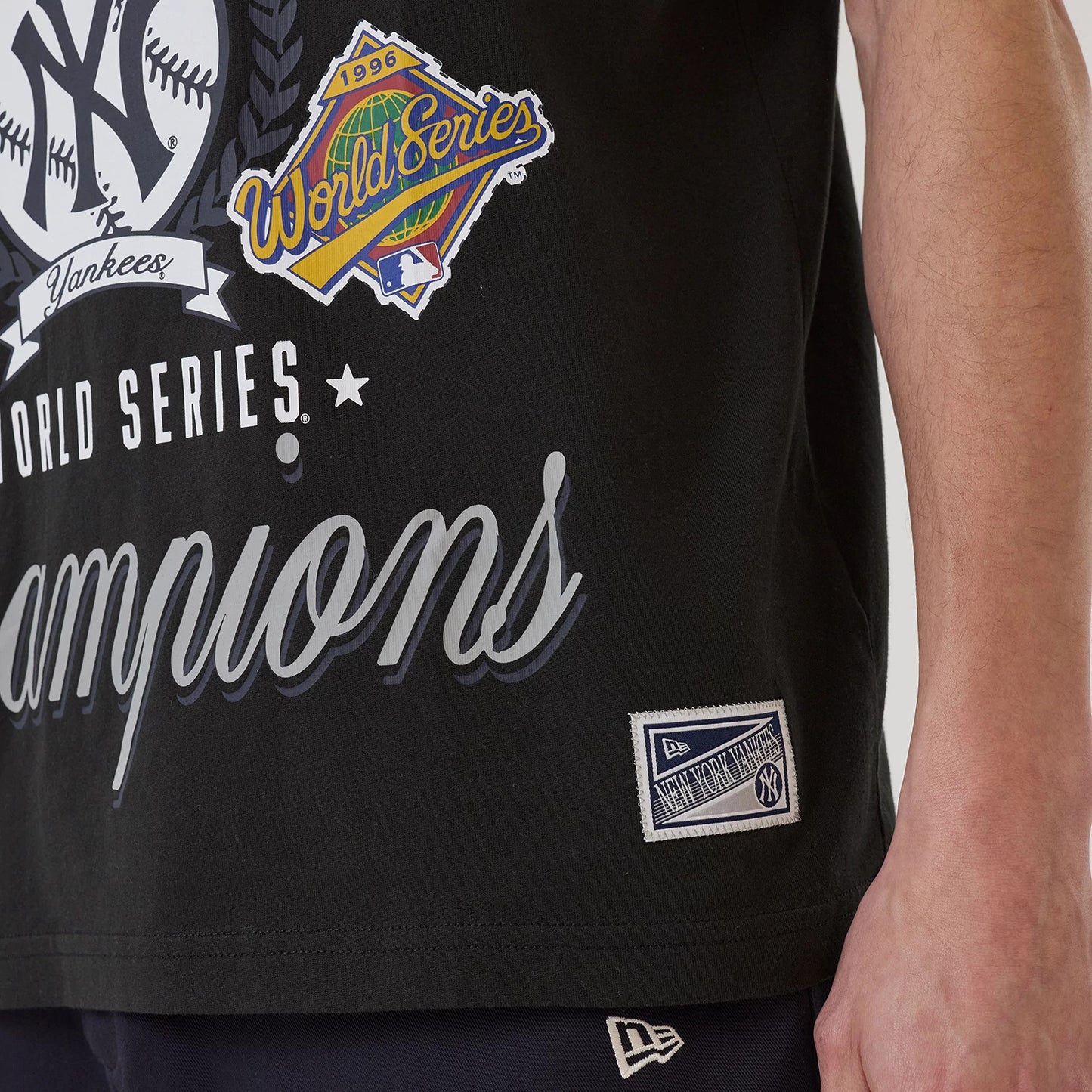 The model is wearing this MLB Sport Classic New York Yankees T-Shirt in black. 4