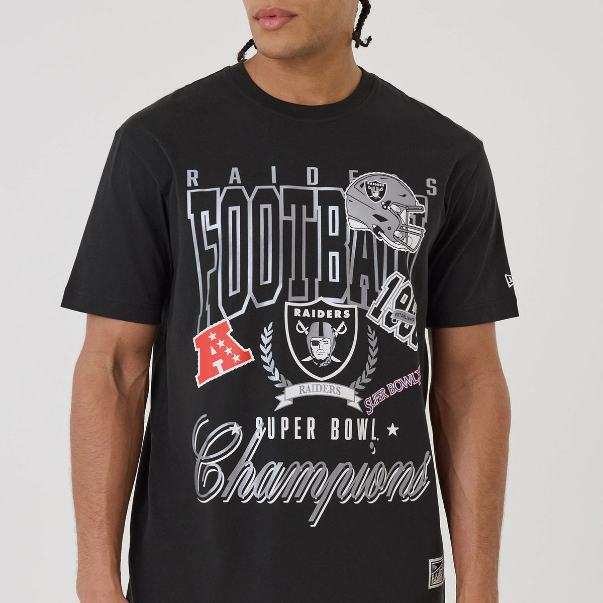 New Era Las Vegas Raiders NFL Sport Classic Black T-Shirt, front view showcasing Raiders Football and Super Bowl Champions graphics across the chest, a silver embroidered Raiders logo on the sleeve, and a New Era logo near the cuff.