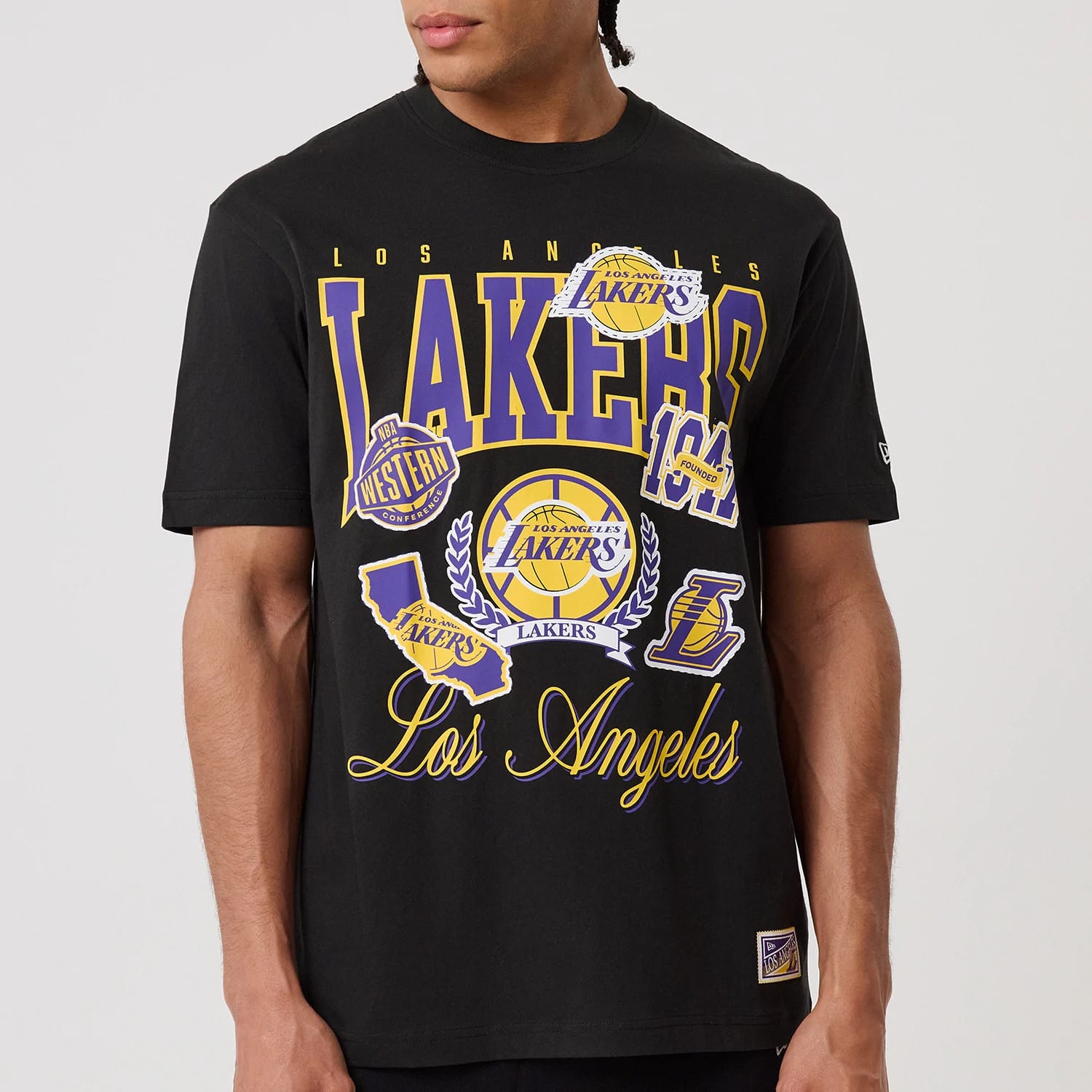 The model is wearing this NBA Sport Classic LA Lakers T-Shirt in black. 3
