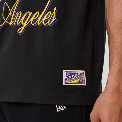 The model is wearing this NBA Sport Classic LA Lakers T-Shirt in black. 6