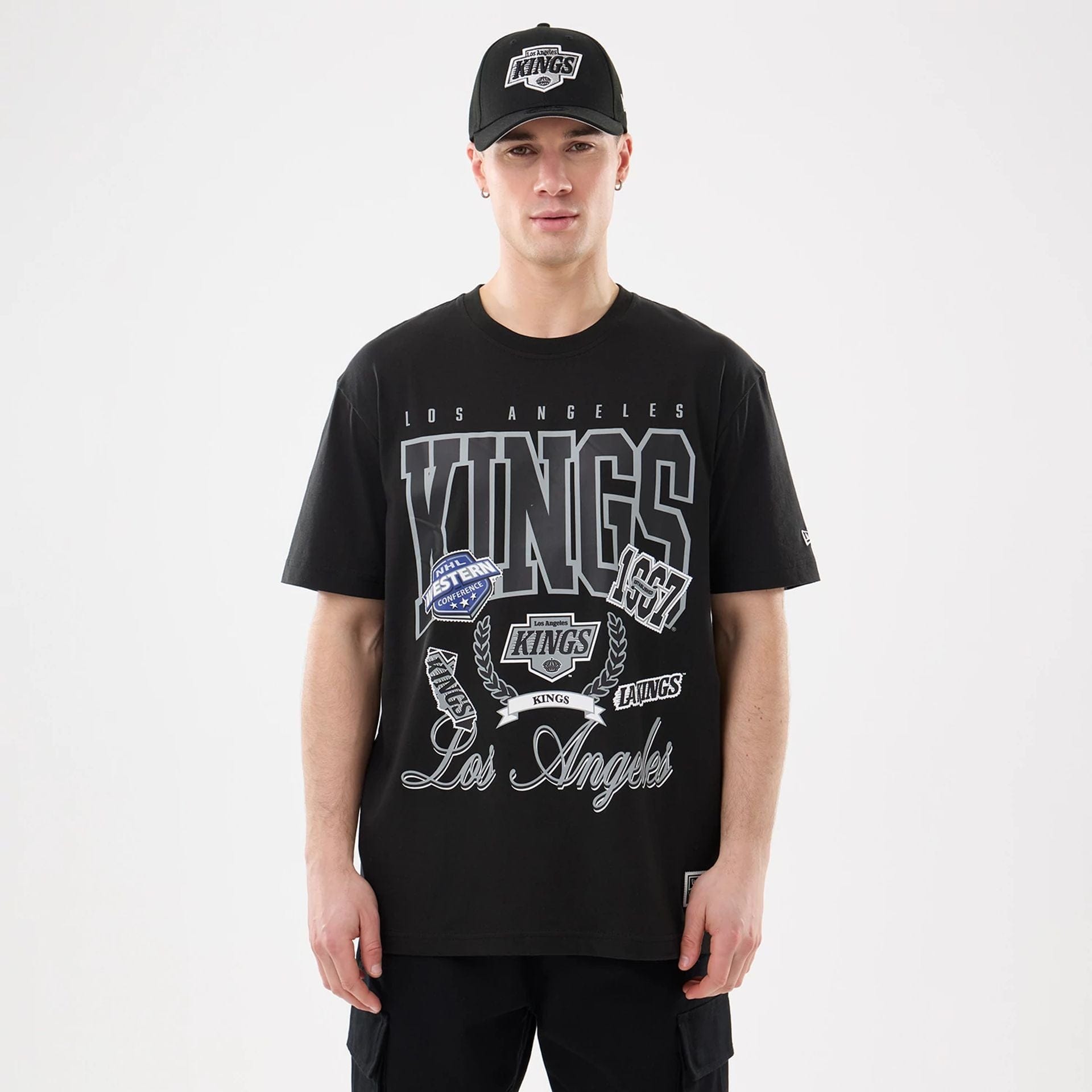 The model is wearing this NHL Sport Classic LA Kings T-Shirt in black. 1