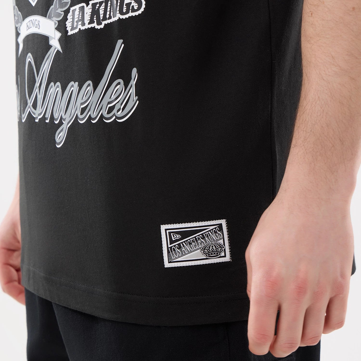 The model is wearing this NHL Sport Classic LA Kings T-Shirt in black. 3