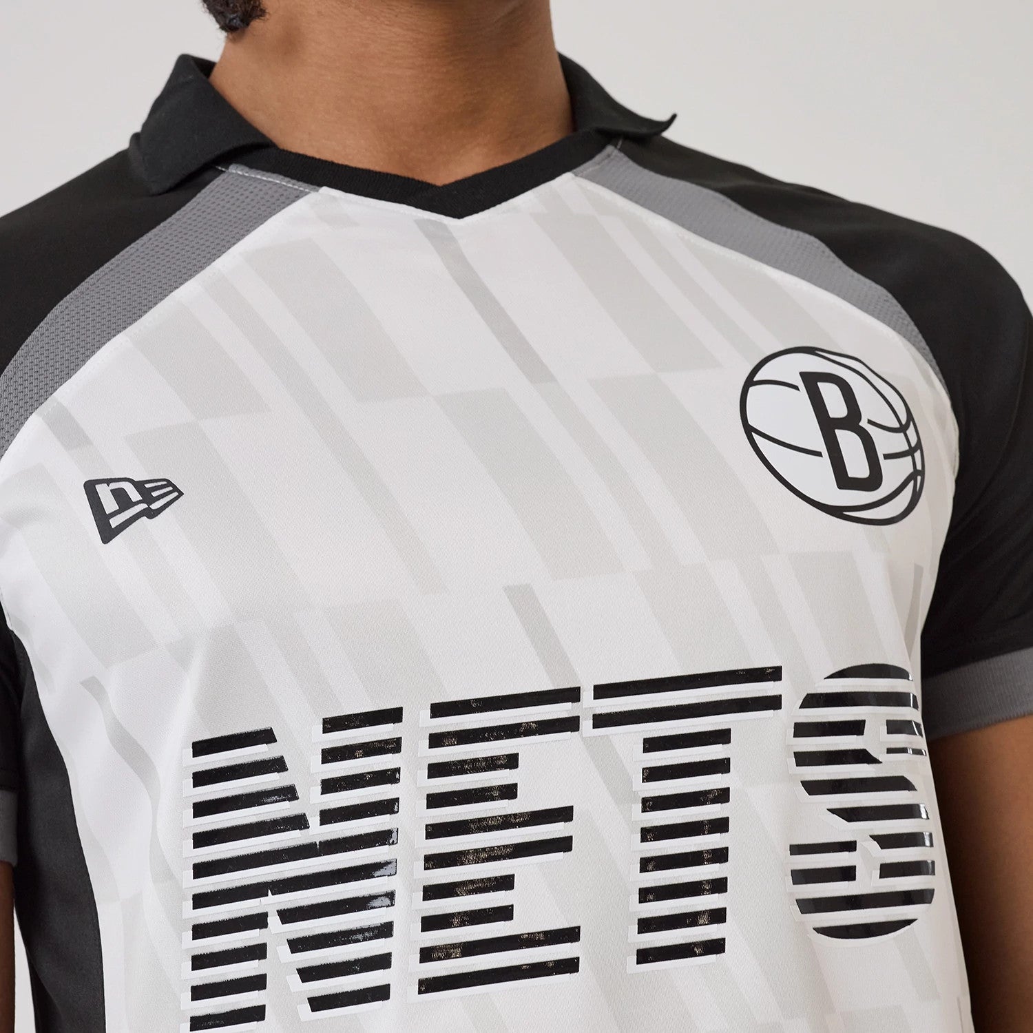 The model is wearing this NBA Match Brooklyn Nets T-Shirt in black. 3