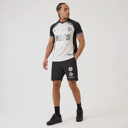 The model is wearing this NBA Match Brooklyn Nets T-Shirt in black. 8