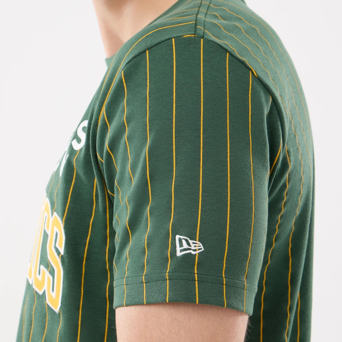 The model is wearing this MLB Pinstripe Athletics T-Shirt in dark green. 3