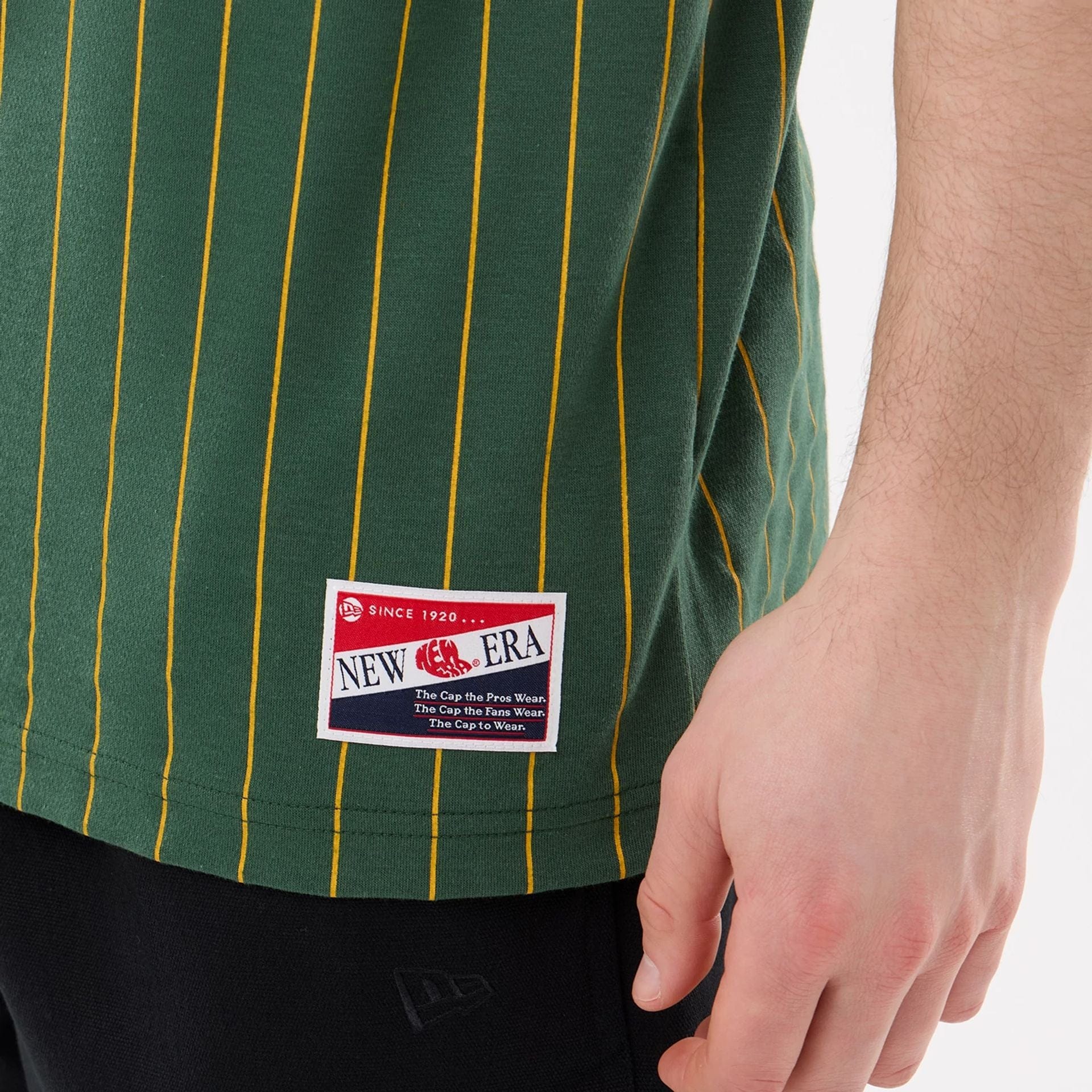 The model is wearing this MLB Pinstripe Athletics T-Shirt in dark green. 4