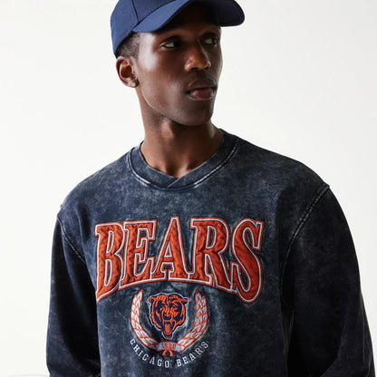 The model is wearing this NFL Chicago Bears Crew Neck Sweater in navy. 4