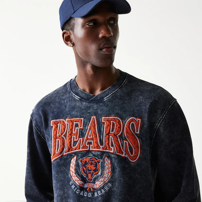 New Era Chicago Bears NFL Navy Crew Neck Sweater, front view on a model wearing a navy cap, featuring large orange Bears text and logo embroidery across the chest on a distressed navy fabric.
