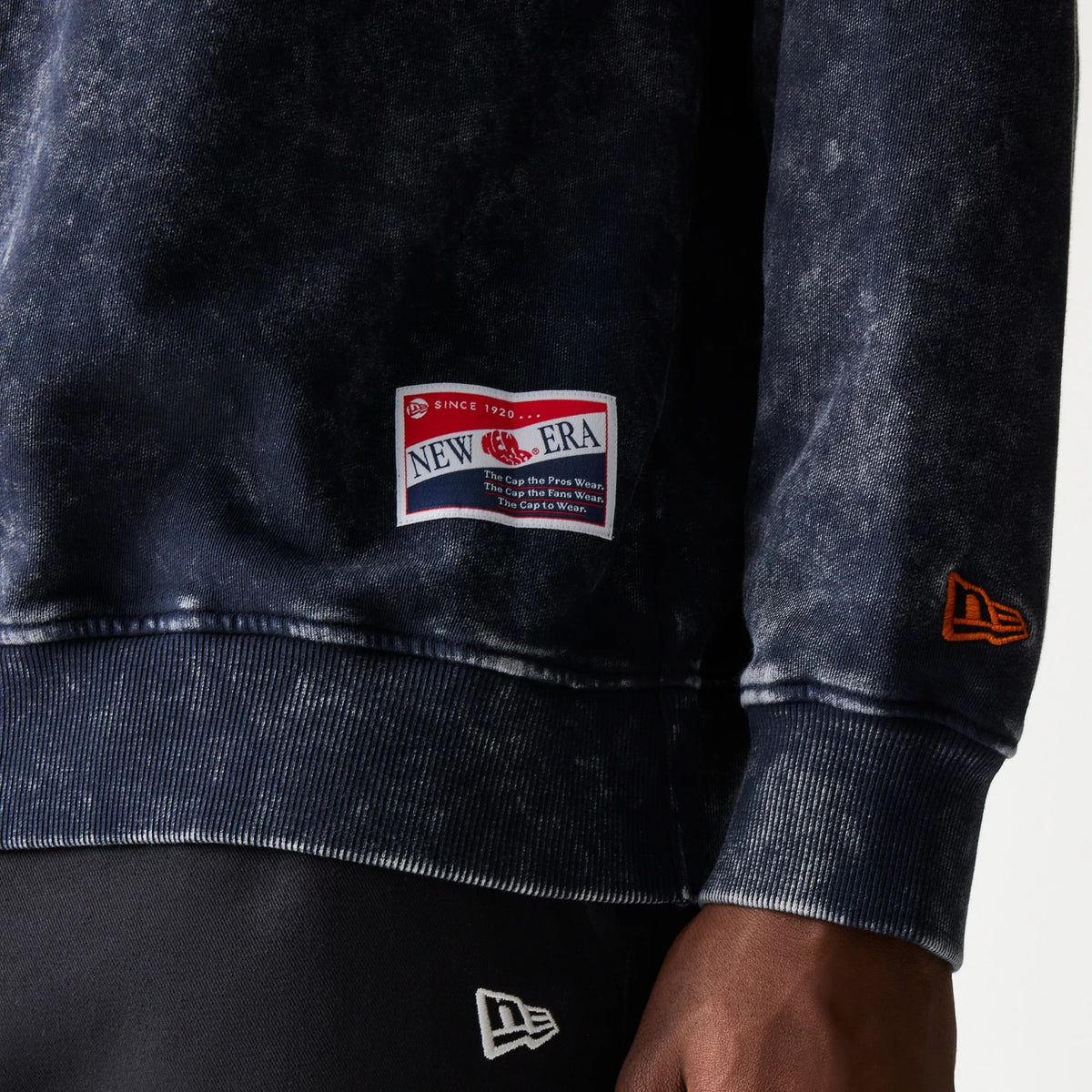 The model is wearing this NFL Chicago Bears Crew Neck Sweater in navy. 5