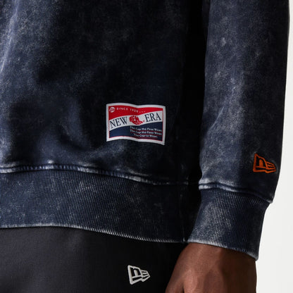 The model is wearing this NFL Chicago Bears Crew Neck Sweater in navy. 5