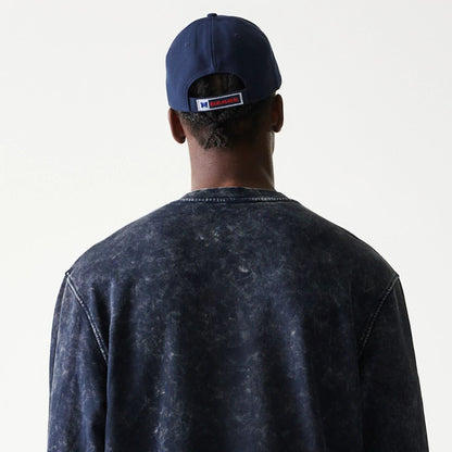 The model is wearing this NFL Chicago Bears Crew Neck Sweater in navy. 8