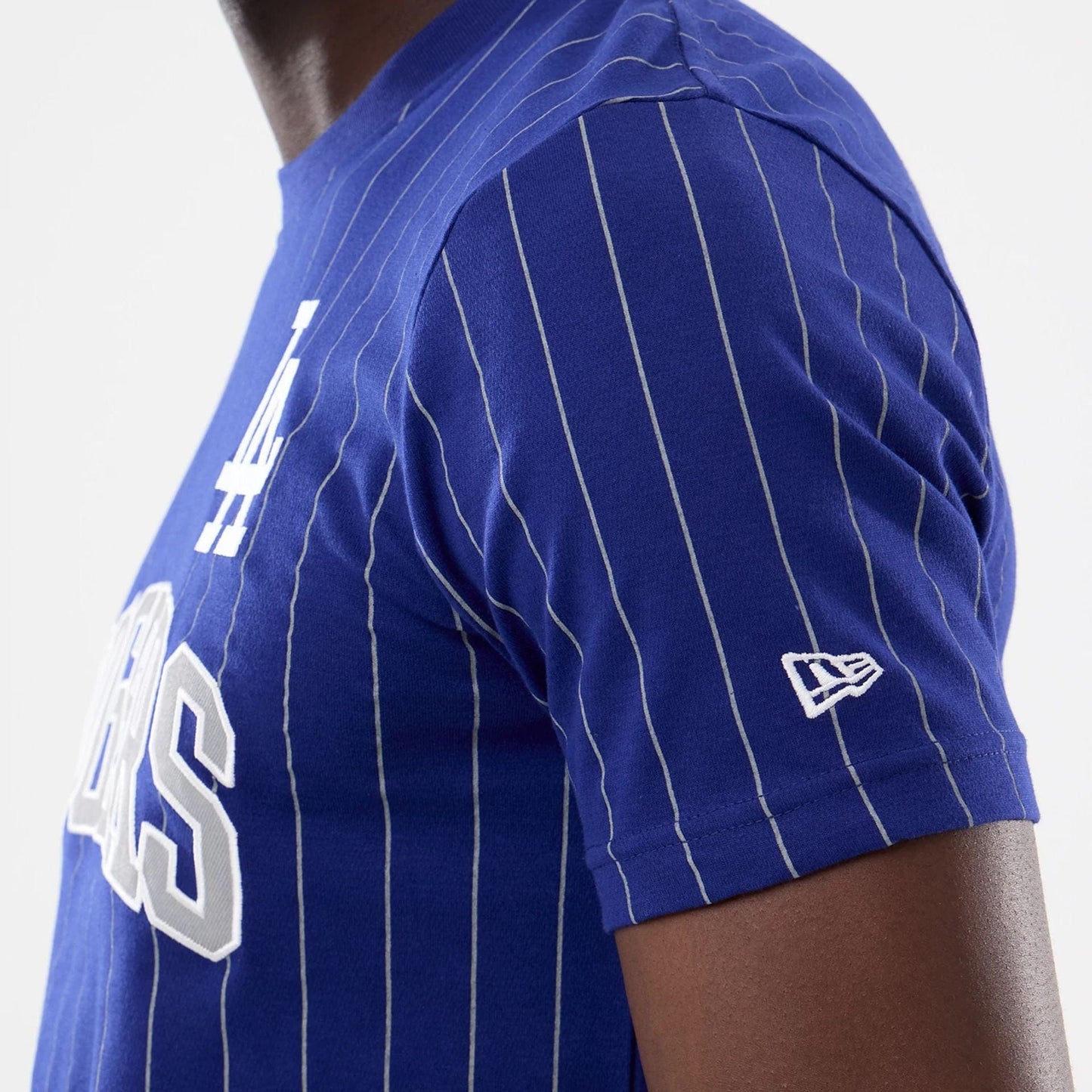 The model is wearing this MLB Pinstripe LA Dodgers T-Shirt in dark blue. 3